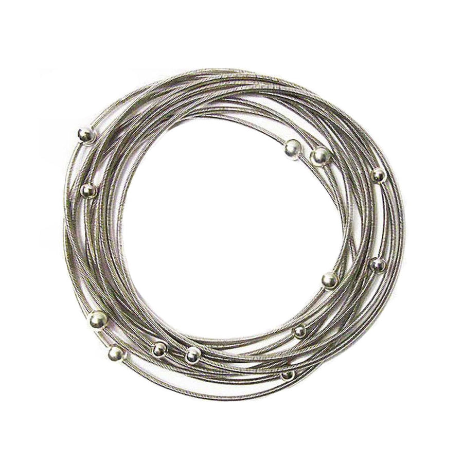 Handcrafted Stack Of Silver Beads Piano Wire Bracelet